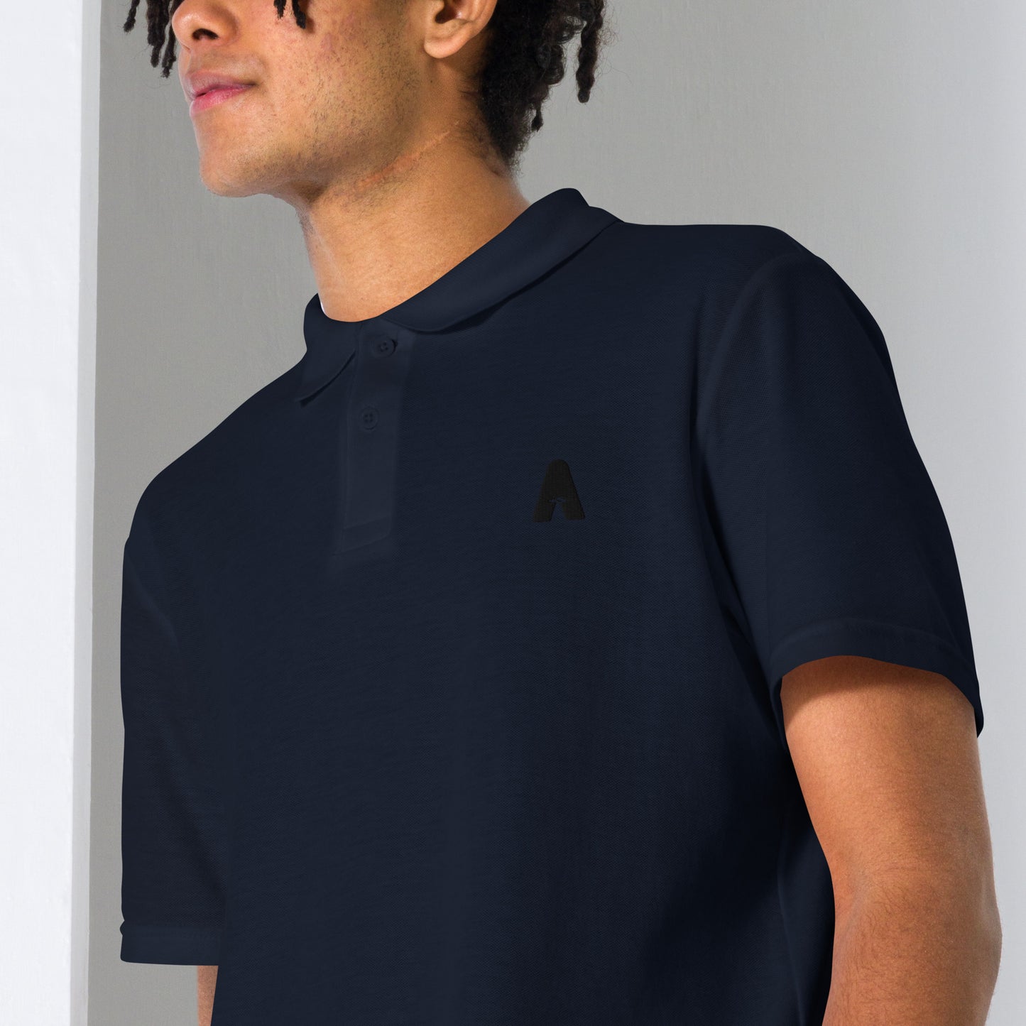 Men's piqué polo "Ancestral, black embroidery"