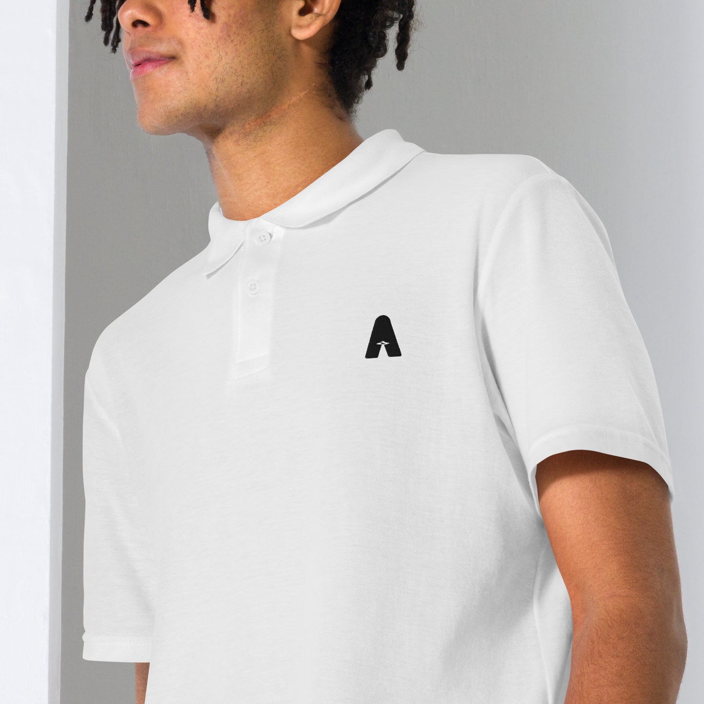 Men's piqué polo "Ancestral, black embroidery"